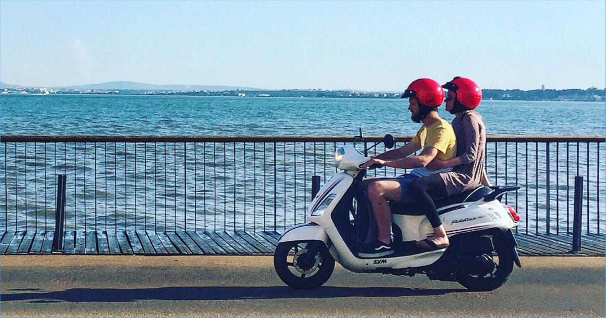 moped with two riders